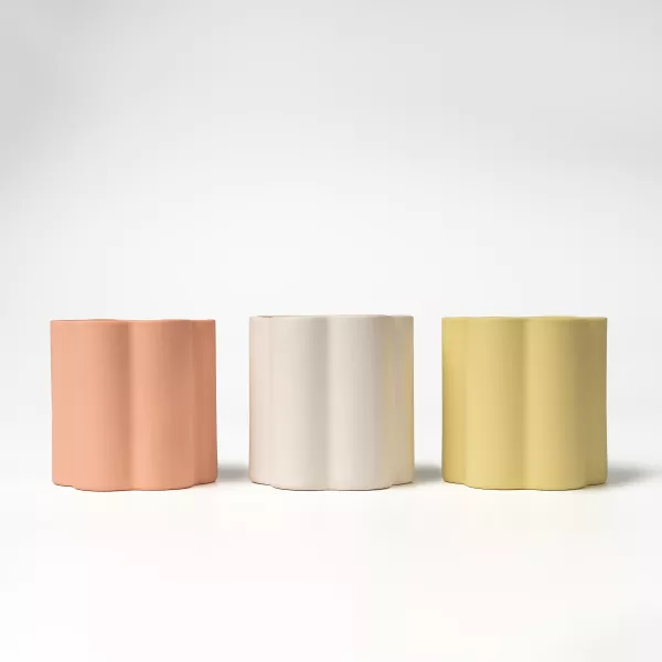 Kunstnerisk blomsterkant keramisk lysestage