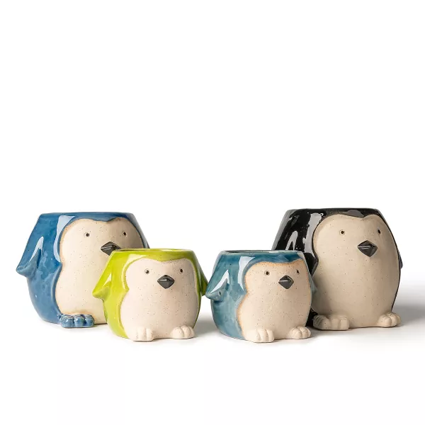 Pingvinformede keramiske lysestager